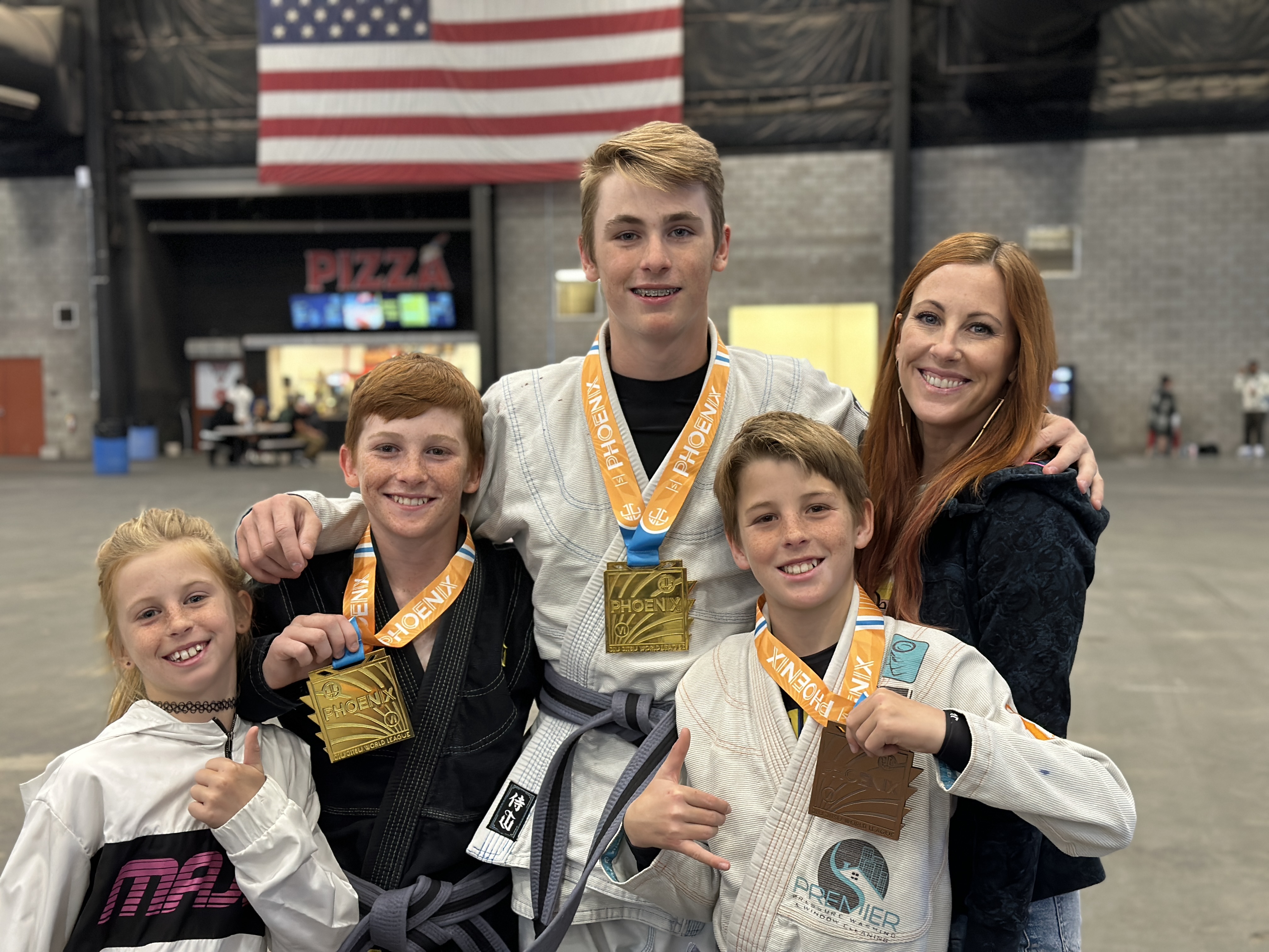 Family practicing jiu jitsu together